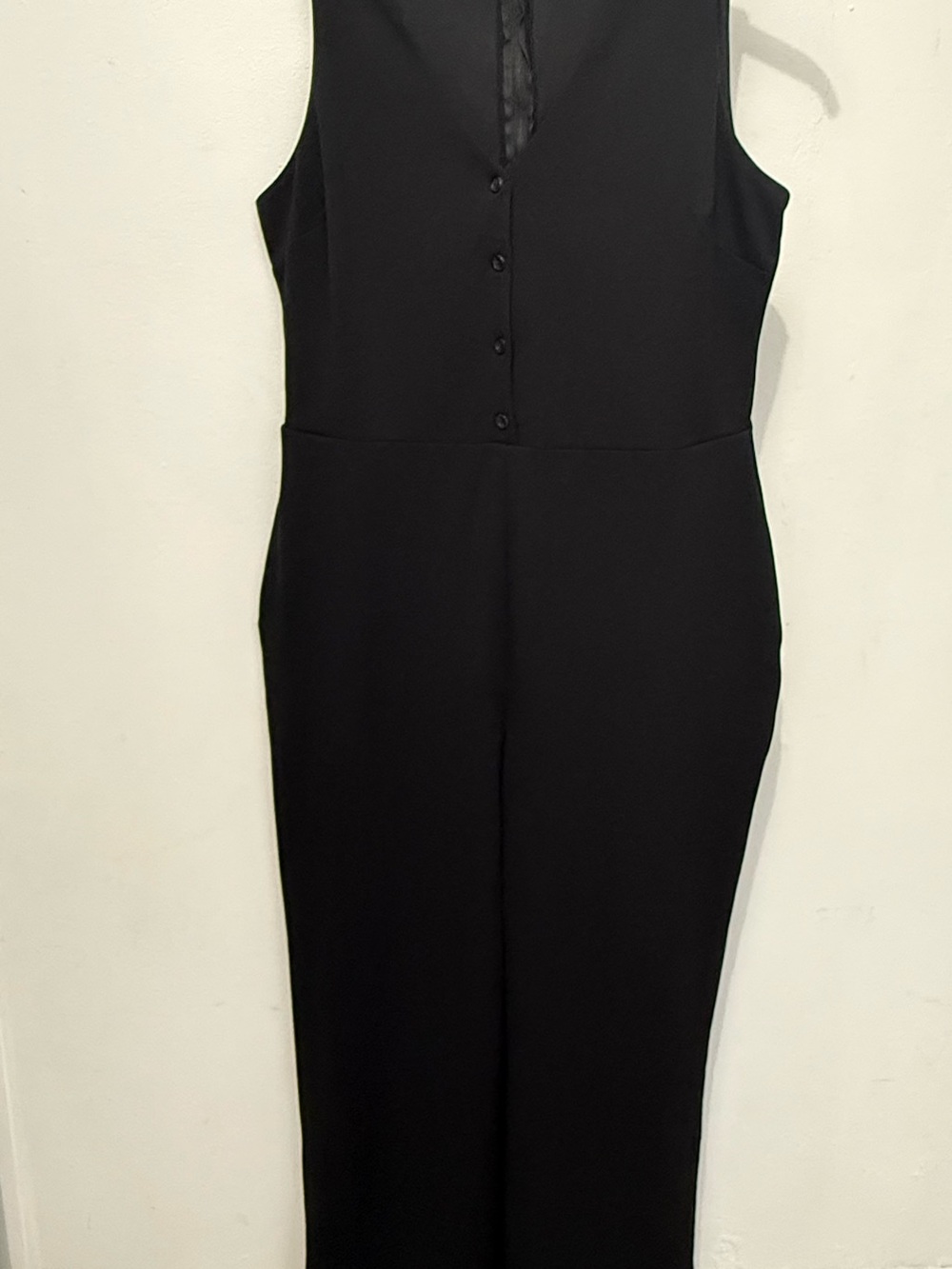 Sleek Black Sleeveless Jumpsuit with Button V-Neck